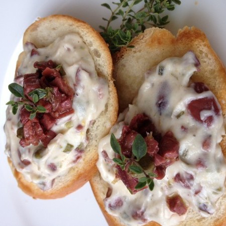 Chive and Garlic Cream Cheese and Olive Tapenade Over Crostini